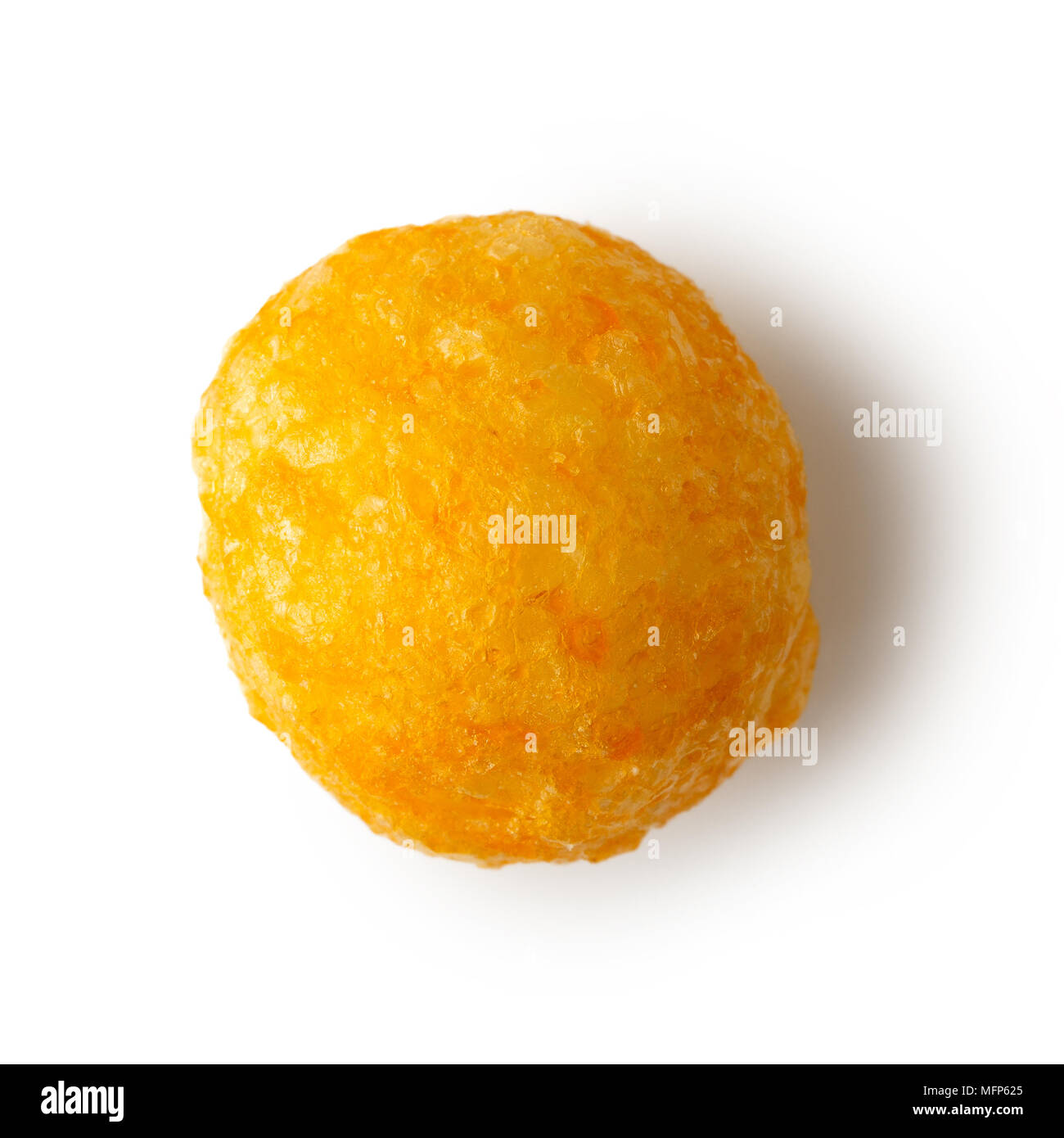 Single extruded puffed cheese ball isolated on white from above. Stock Photo