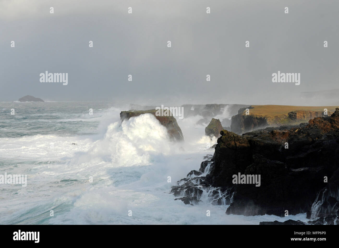 Bid waves at Eshaness cliffs in the Shetland Isle during a big Atlantic storm Stock Photo