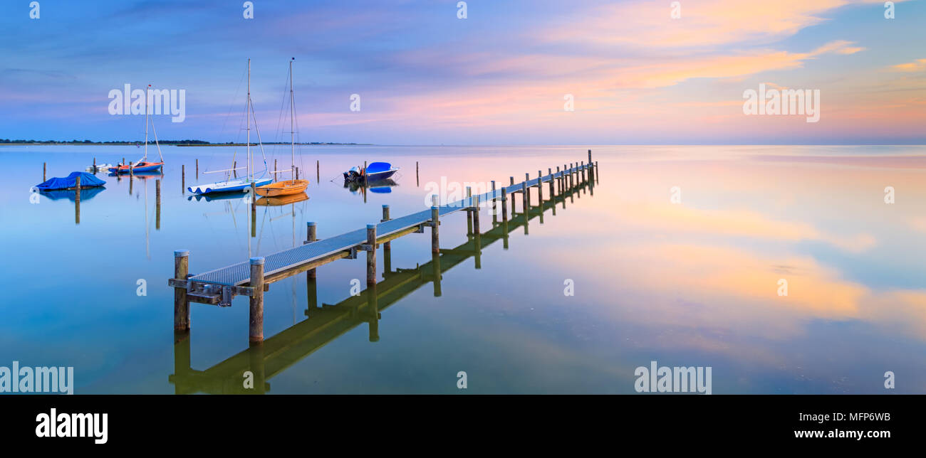 A tranquil and calm summer evening at Lake IJsselmeer near Hindeloopen, The Netherlands Stock Photo