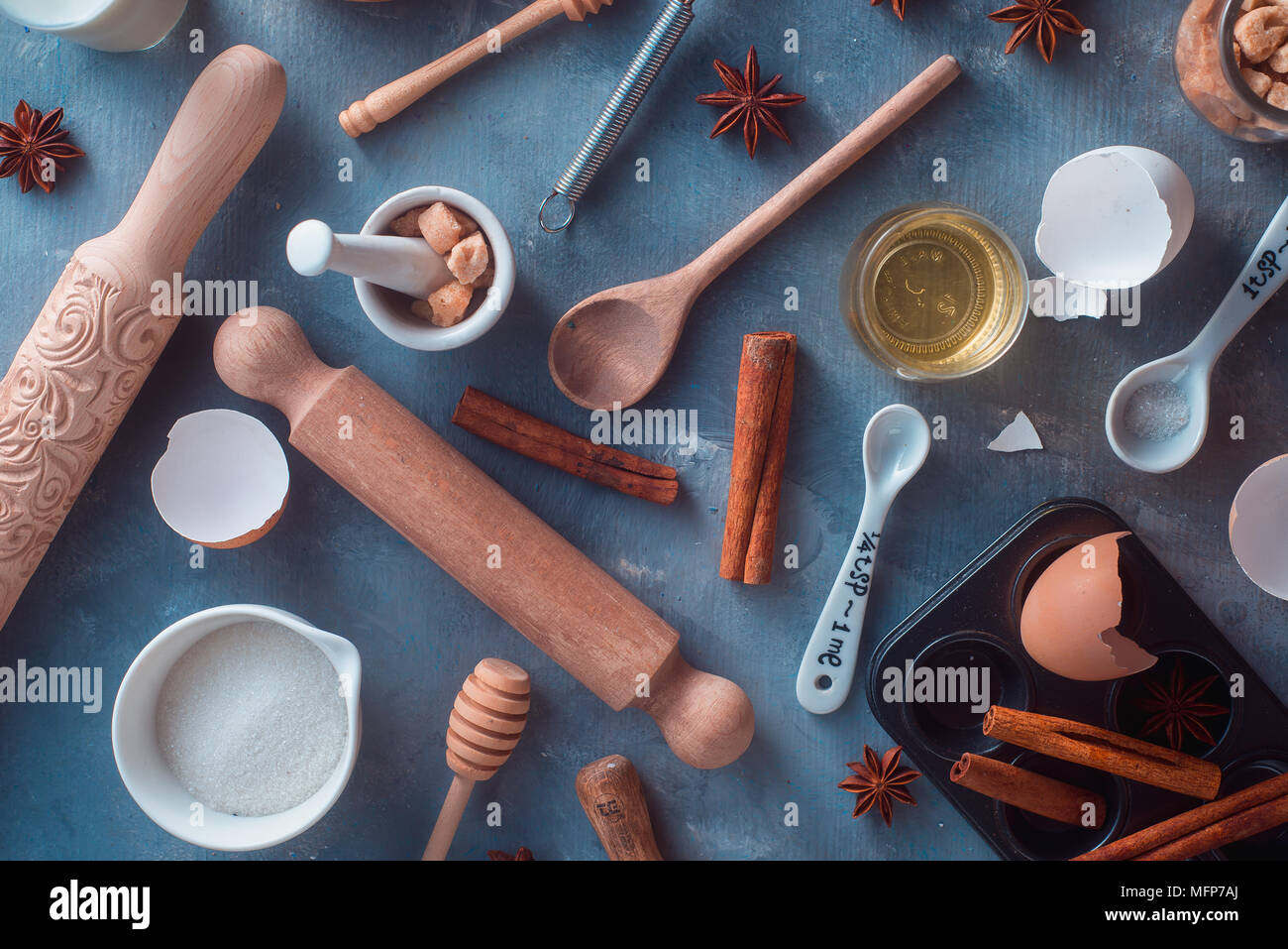 Pattern with baking tools and ingredients on a textured concrete background. Cooking utensils flat lay in nordic style. Modern kitchen concept Stock Photo