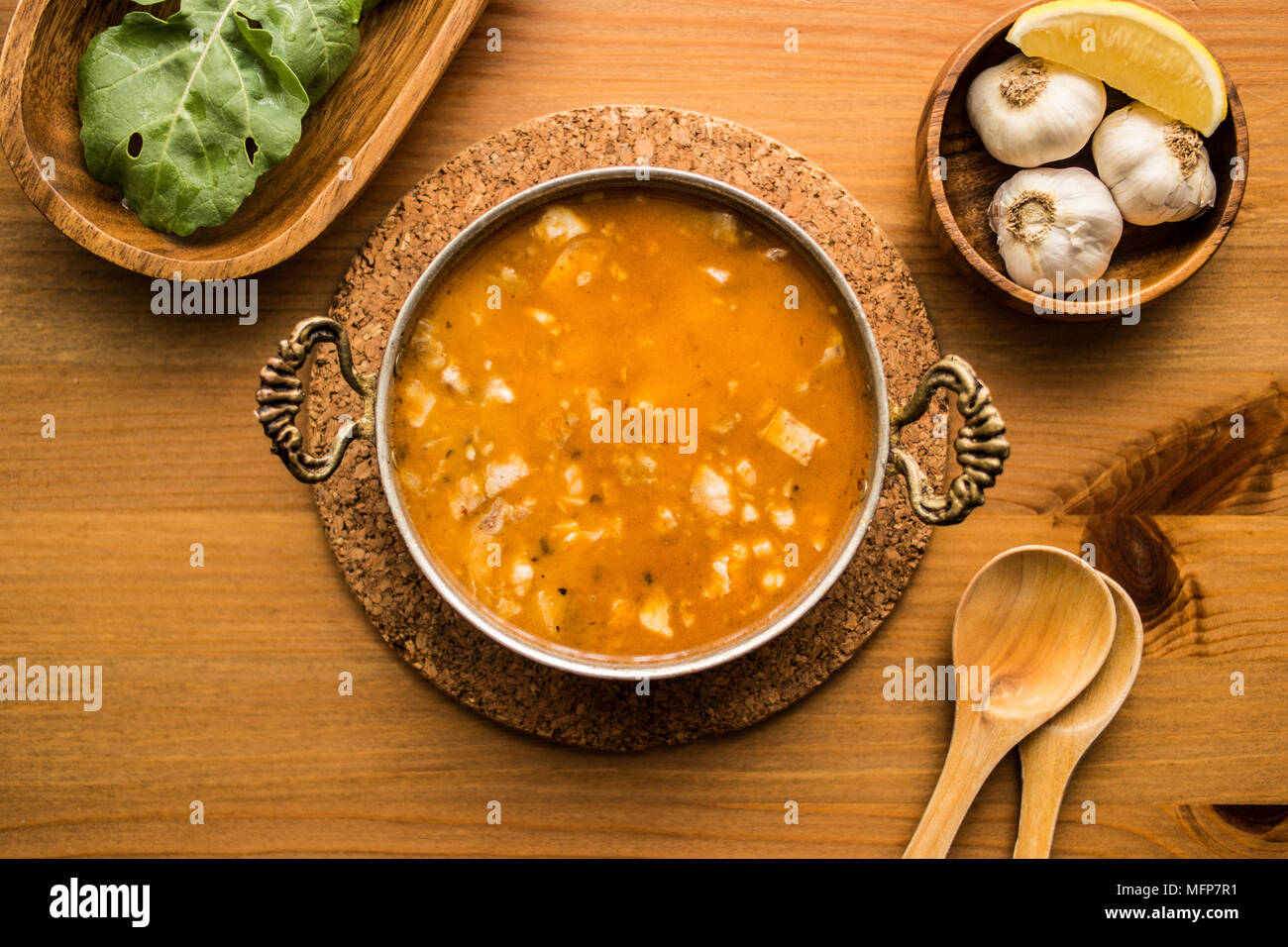 Traditional Turkish Meat Soup Kelle Paca in a copper bowl Stock Photo -  Alamy