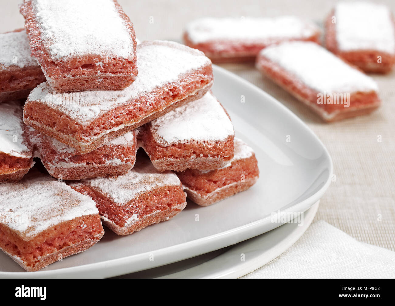 Biscuit Rose de Reims, Pink Biscuit found in French cuisine, It is  customary to dip the biscuit in champagne Stock Photo - Alamy