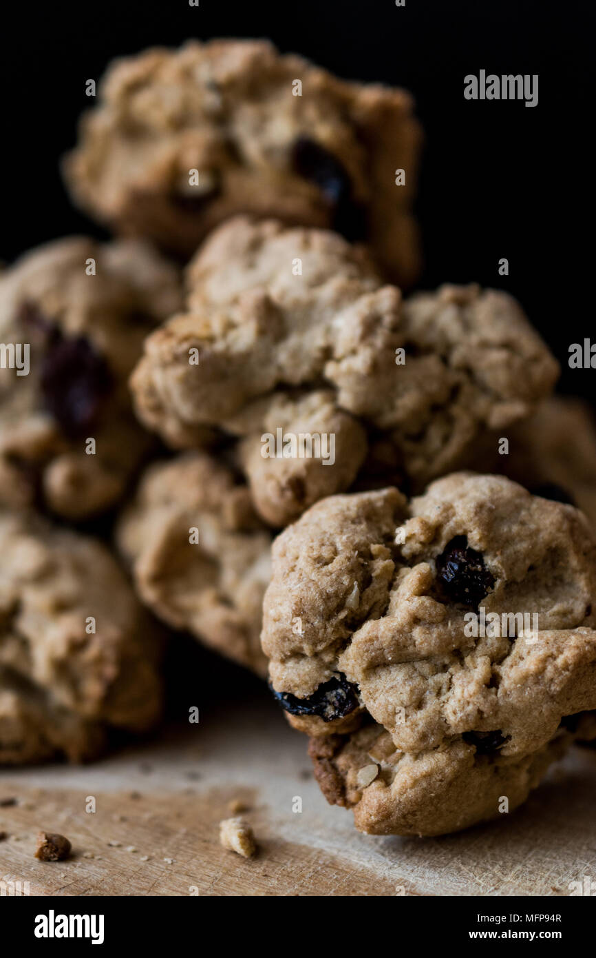A cookie is a small, flat, sweet, baked good, usually containing flour, eggs, sugar, and either butter, cooking oil or another oil or fat. Stock Photo