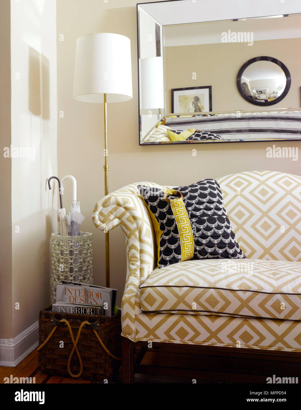 Floor lamp next to sofa in corner of living room, New York, USA Stock