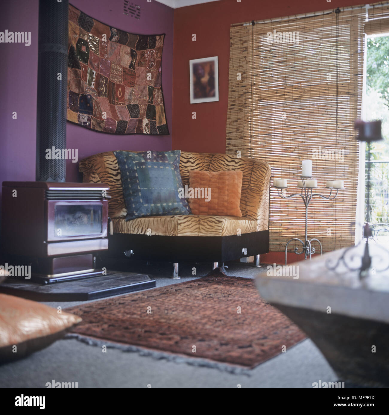 A New Age Sitting Room With Wood Burning Stove Tiger Print Corner