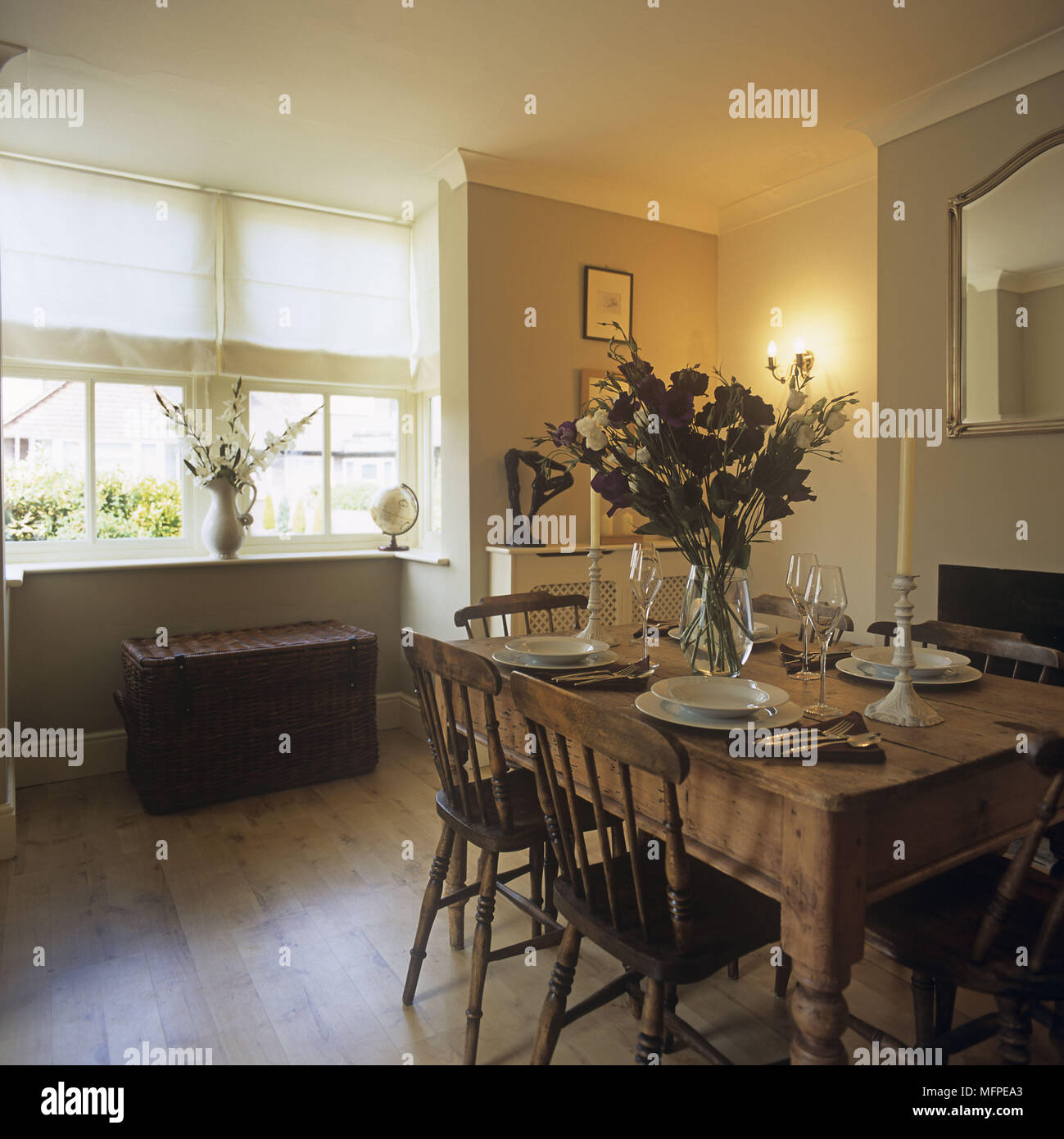 An overview of a dining room country wooden table and chair Stock Photo