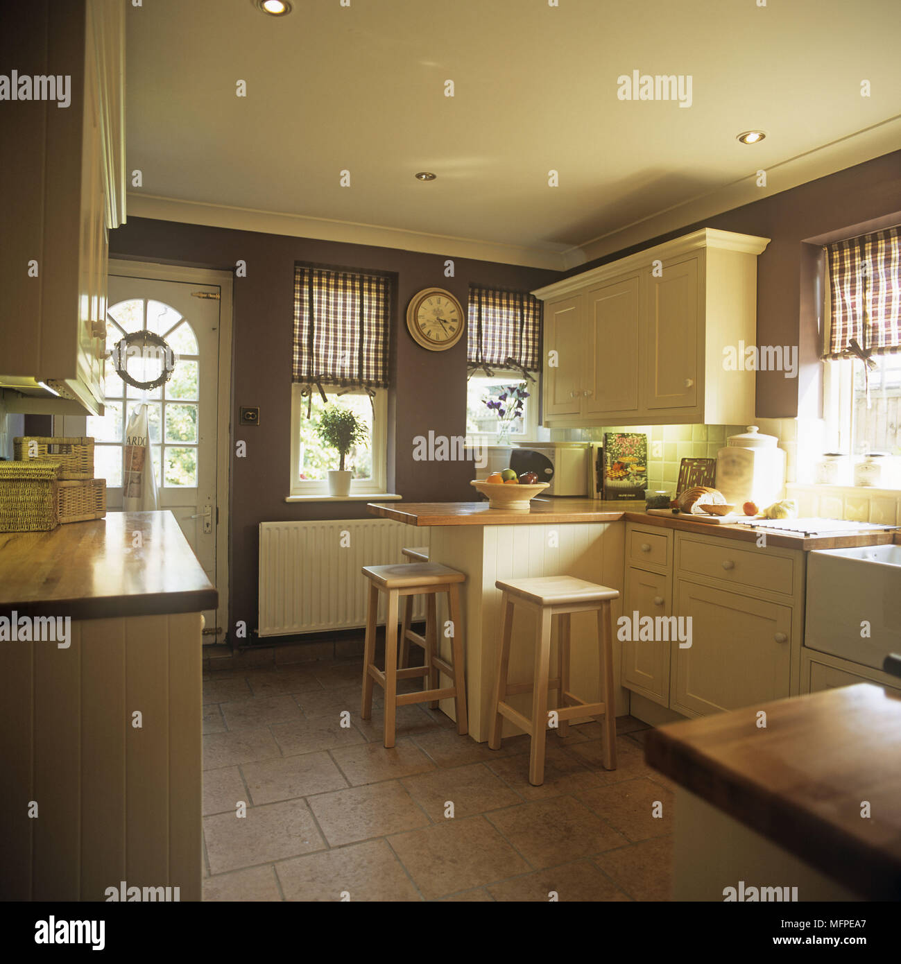 An overview of a traditional country kitchen breakfast bar Stock Photo