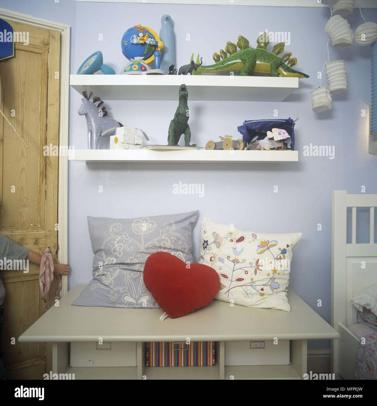 Storage And Shelves With Toys In Boys Bedroom Stock Photo