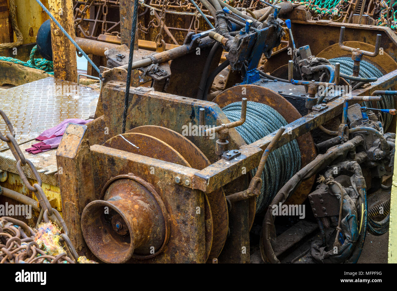 A net cable winch or capstan on a fishing trawler. Stock Photo