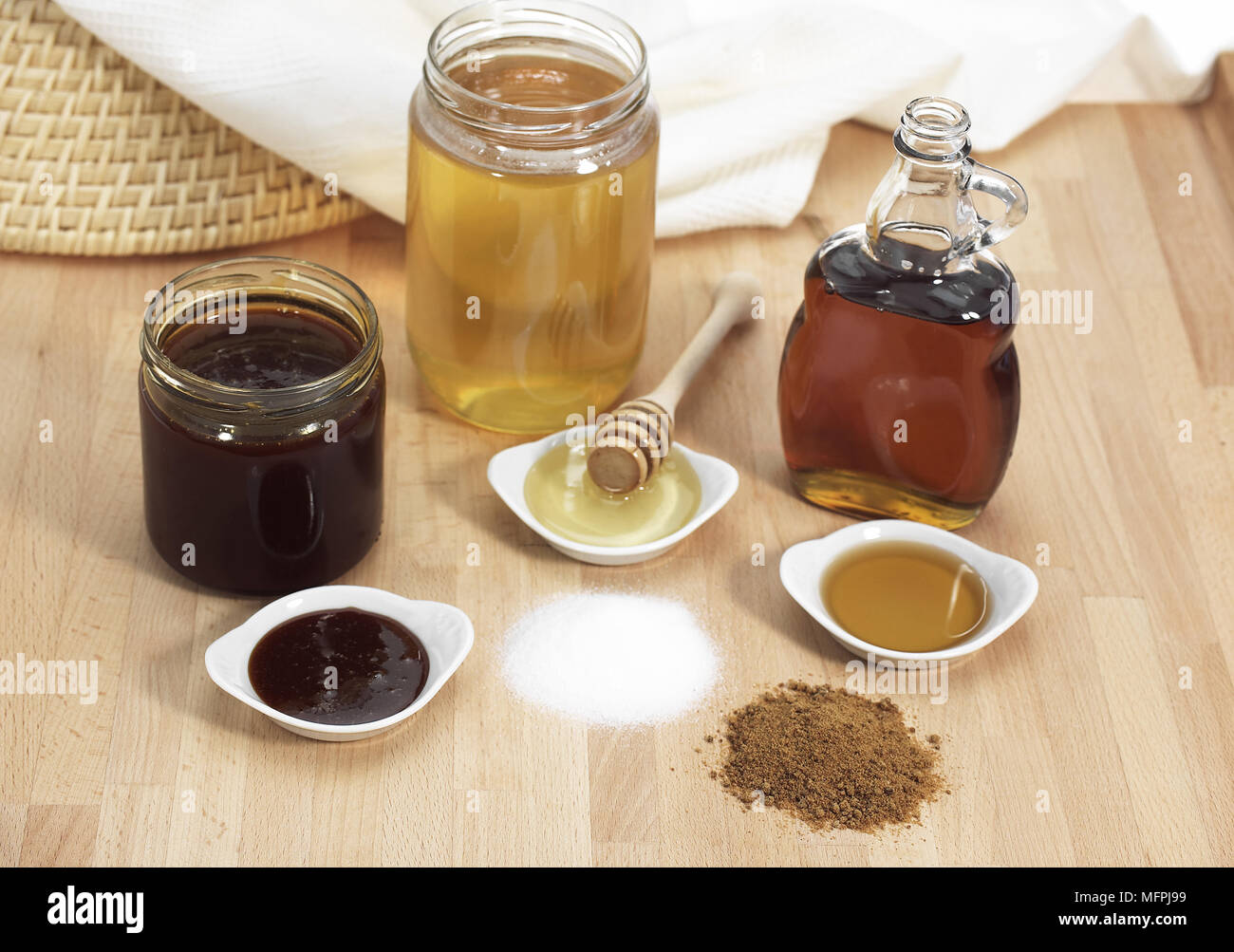 Fine Granulated Sugar Brown Sugar Maple Syrup Treacle And Honey Stock Photo Alamy