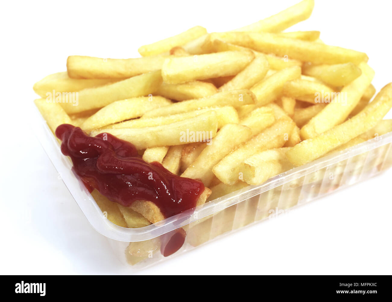 French Fries with Ketchup against White Background Stock Photo