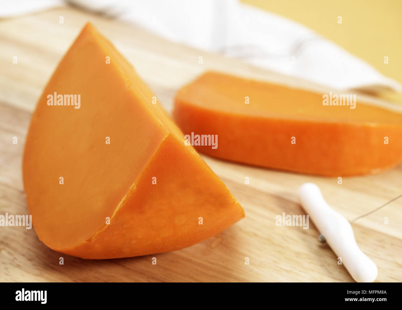 Mimolette, French Cheese produced from Cow's Milk Stock Photo Alamy