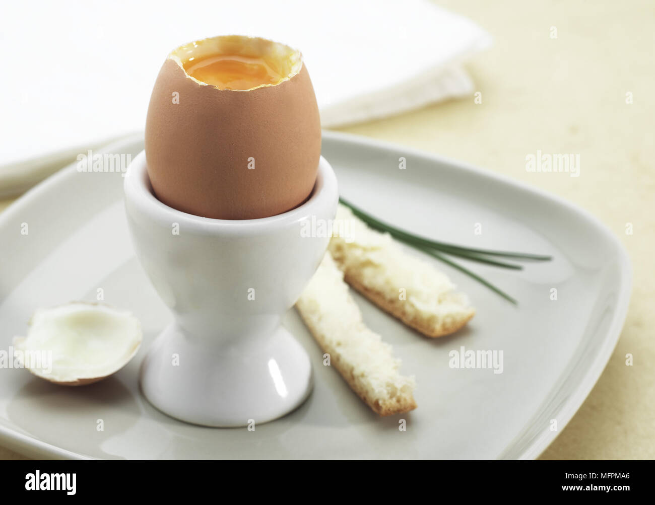 Soft-Boiled Egg in Egg Cup Stock Photo