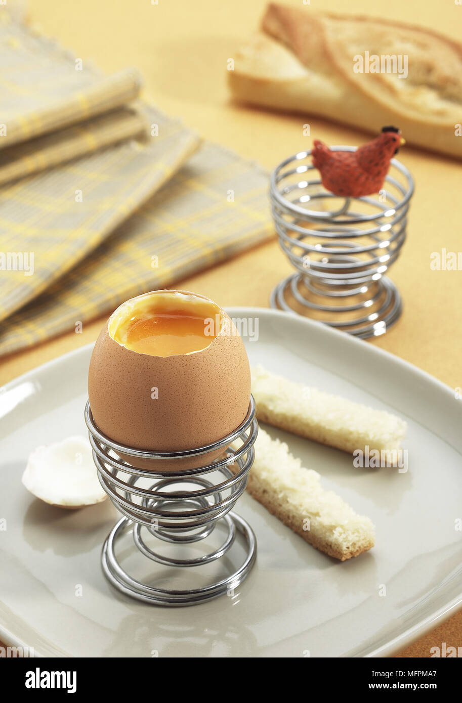 Soft-Boiled Egg in Egg Cup Stock Photo