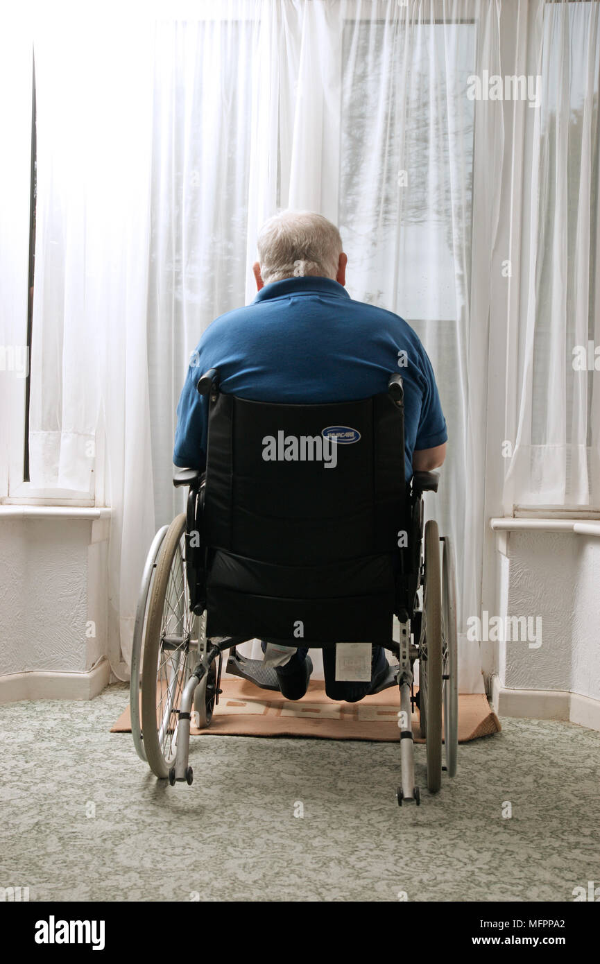 Old man wheelchair thinking hi-res stock photography and images - Alamy