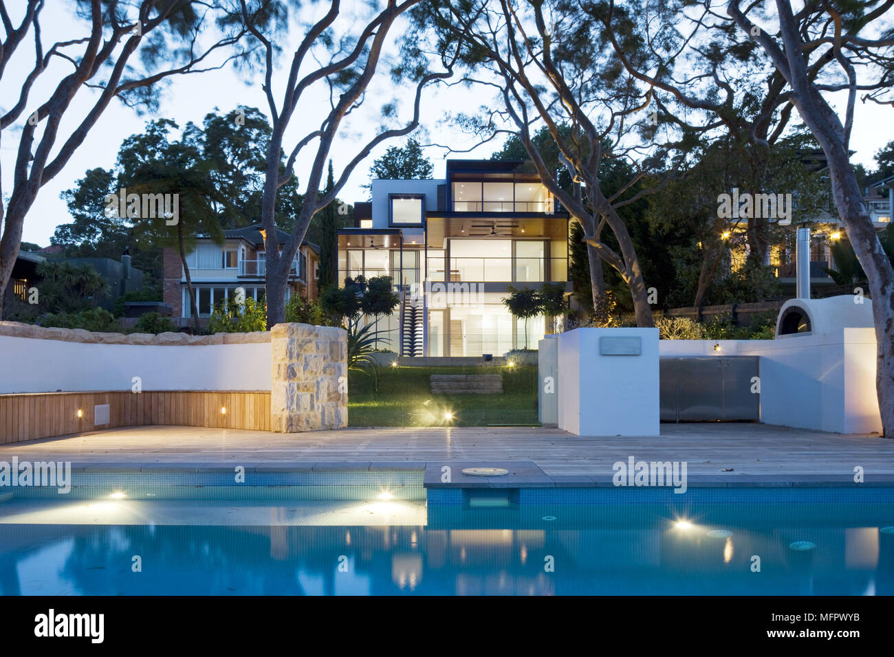 Exterior of modern house at night Stock Photo - Alamy