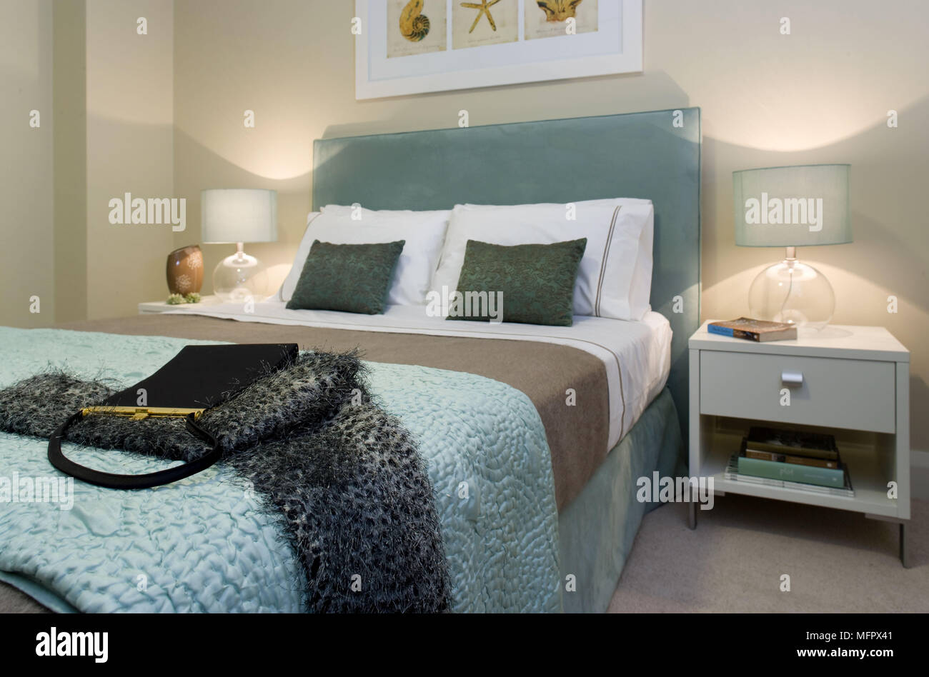 Modern double bed with bedside tables hires stock photography and