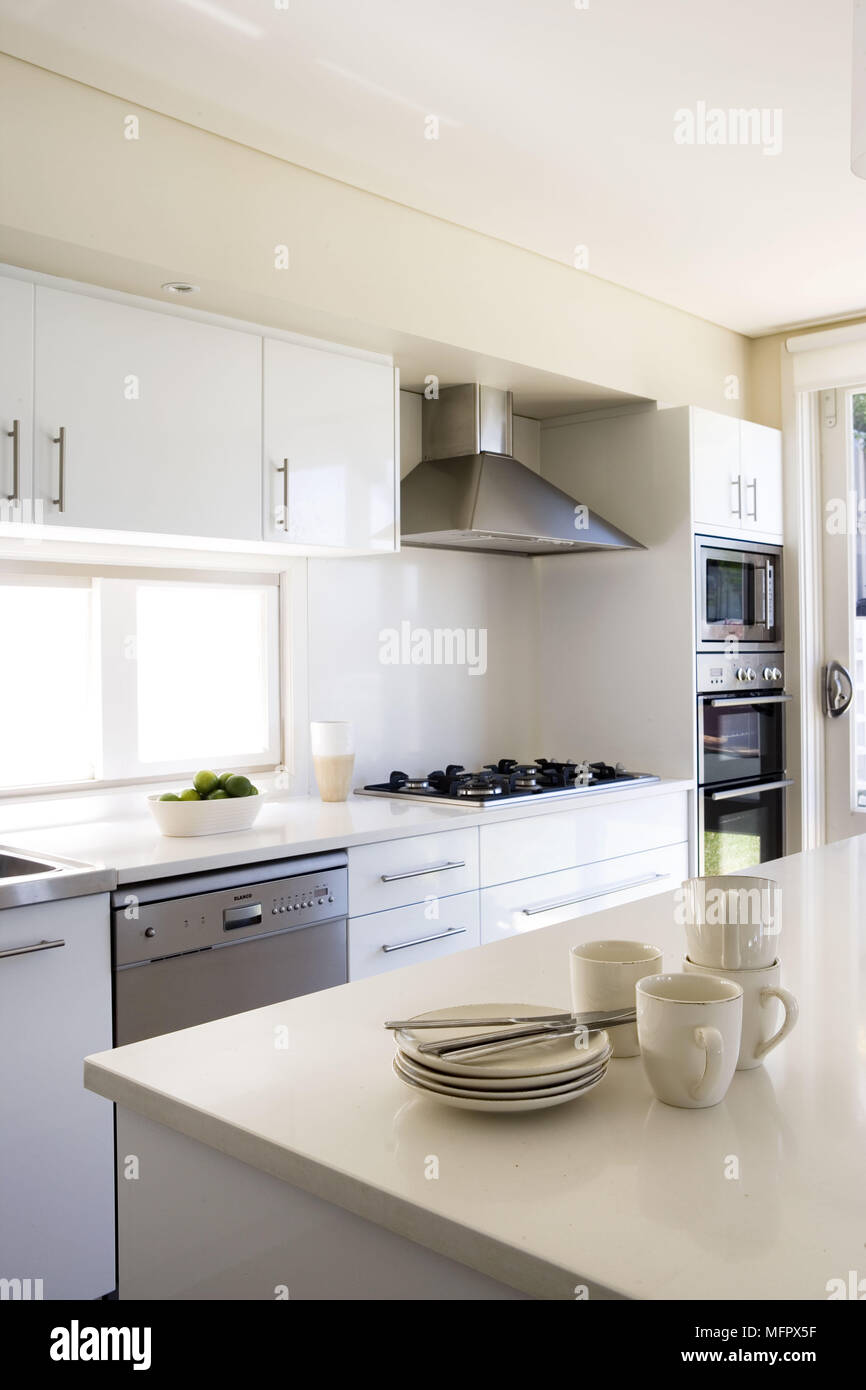 Modern kitchen with central island unit Stock Photo