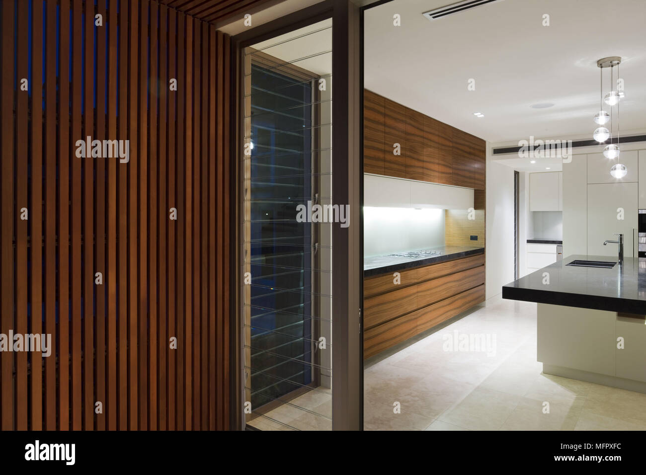 View through patio doors to modern kitchen Stock Photo Alamy