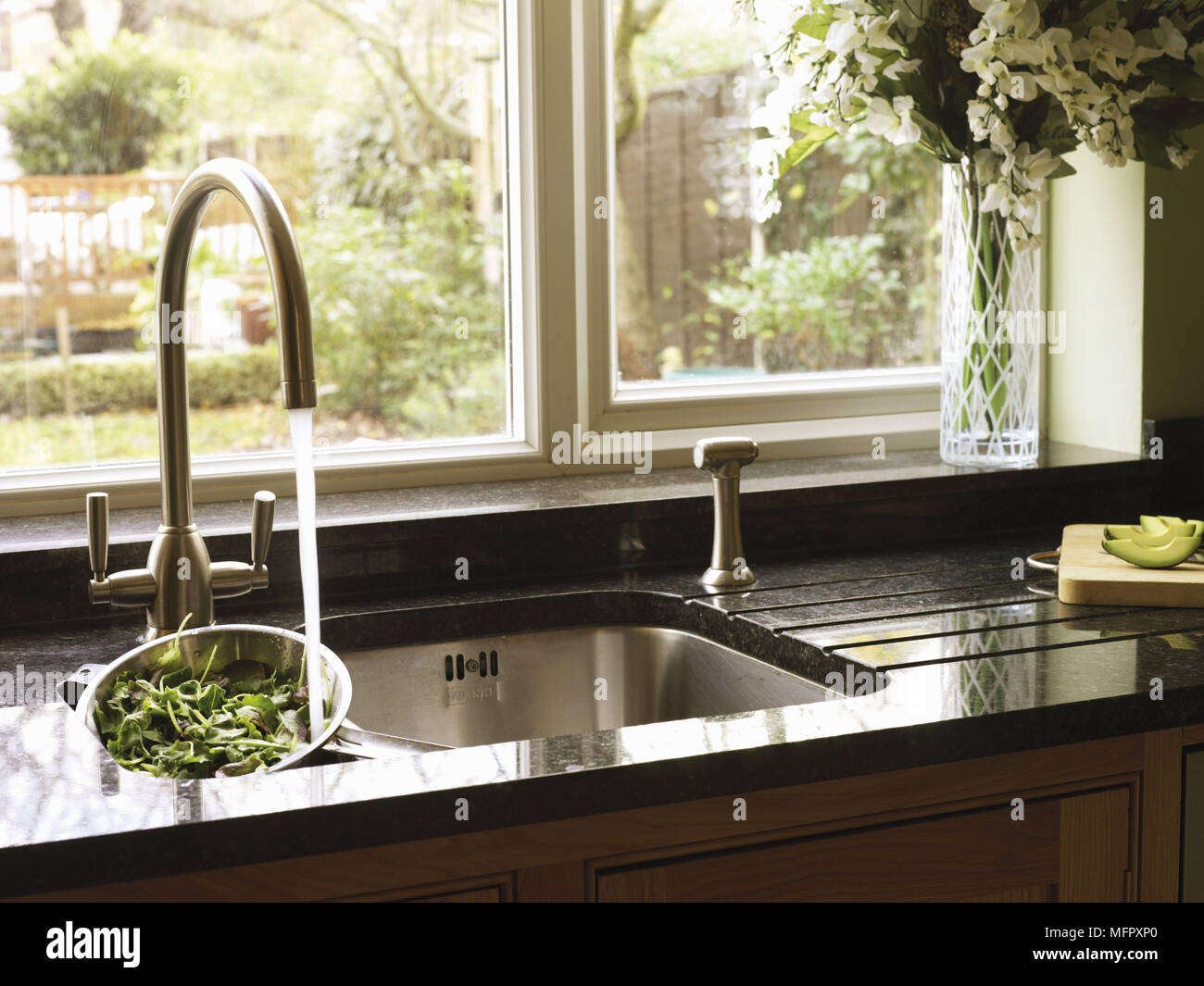 Extractor fan above gas hob in modern kitchen Stock Photo Alamy