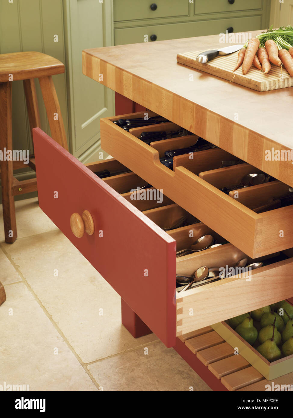 Freestanding worktop unit with open cutlery drawers Stock Photo - Alamy