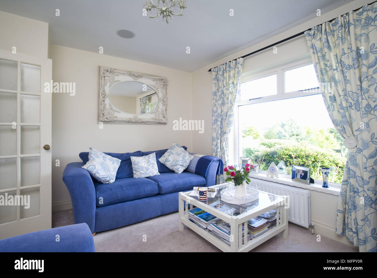 Champagne in ice bucket on wooden sideboard Stock Photo Alamy