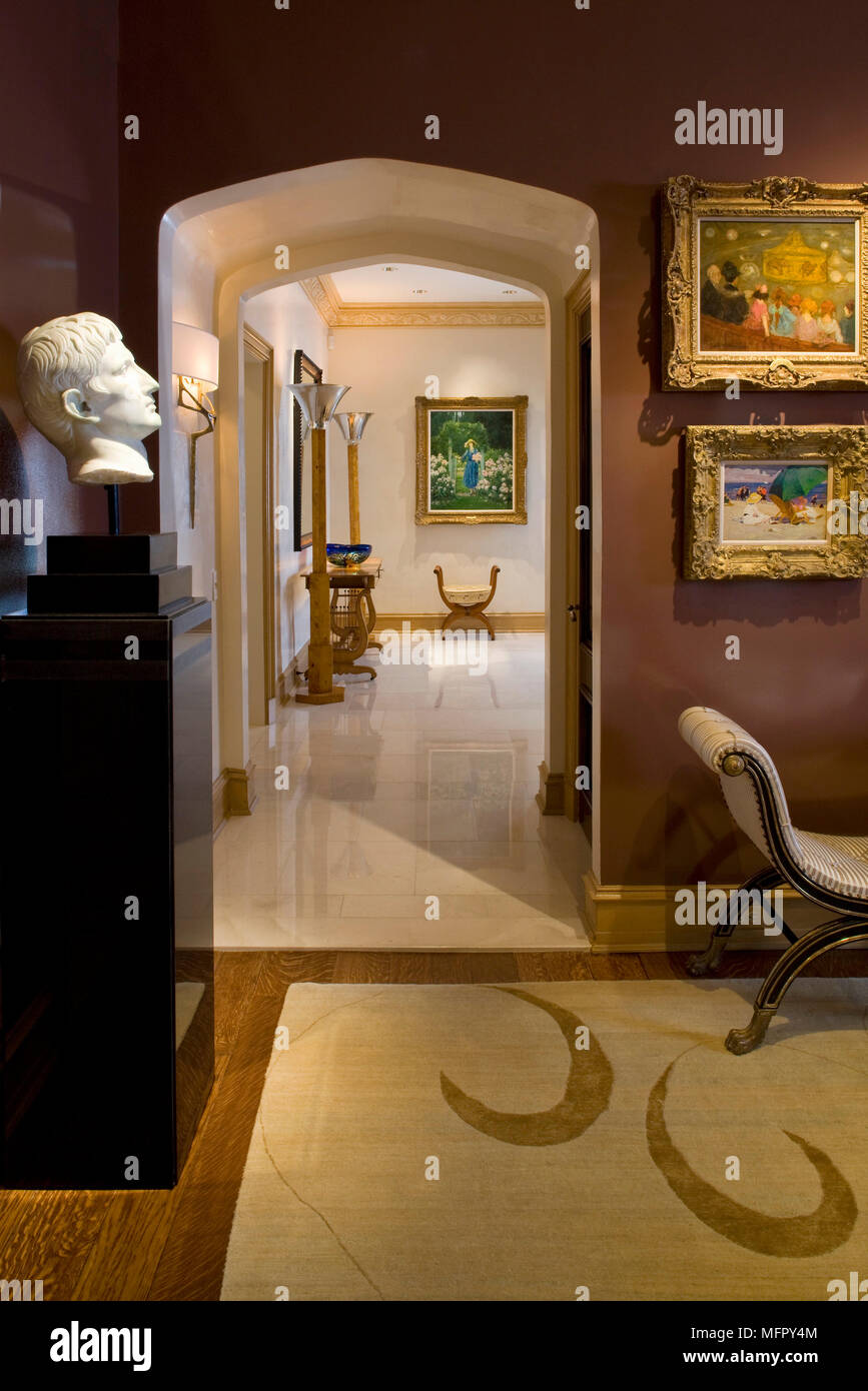View through arched doorway to traditional style hallway Stock Photo