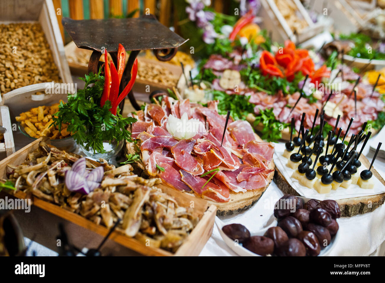 Table Of Wedding Reception With Delicious Food Cheese And Meat