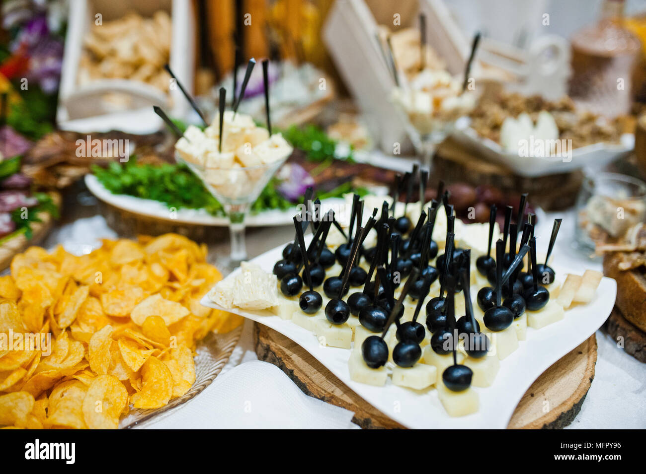 Table Of Wedding Reception With Delicious Food Cheese And Meat