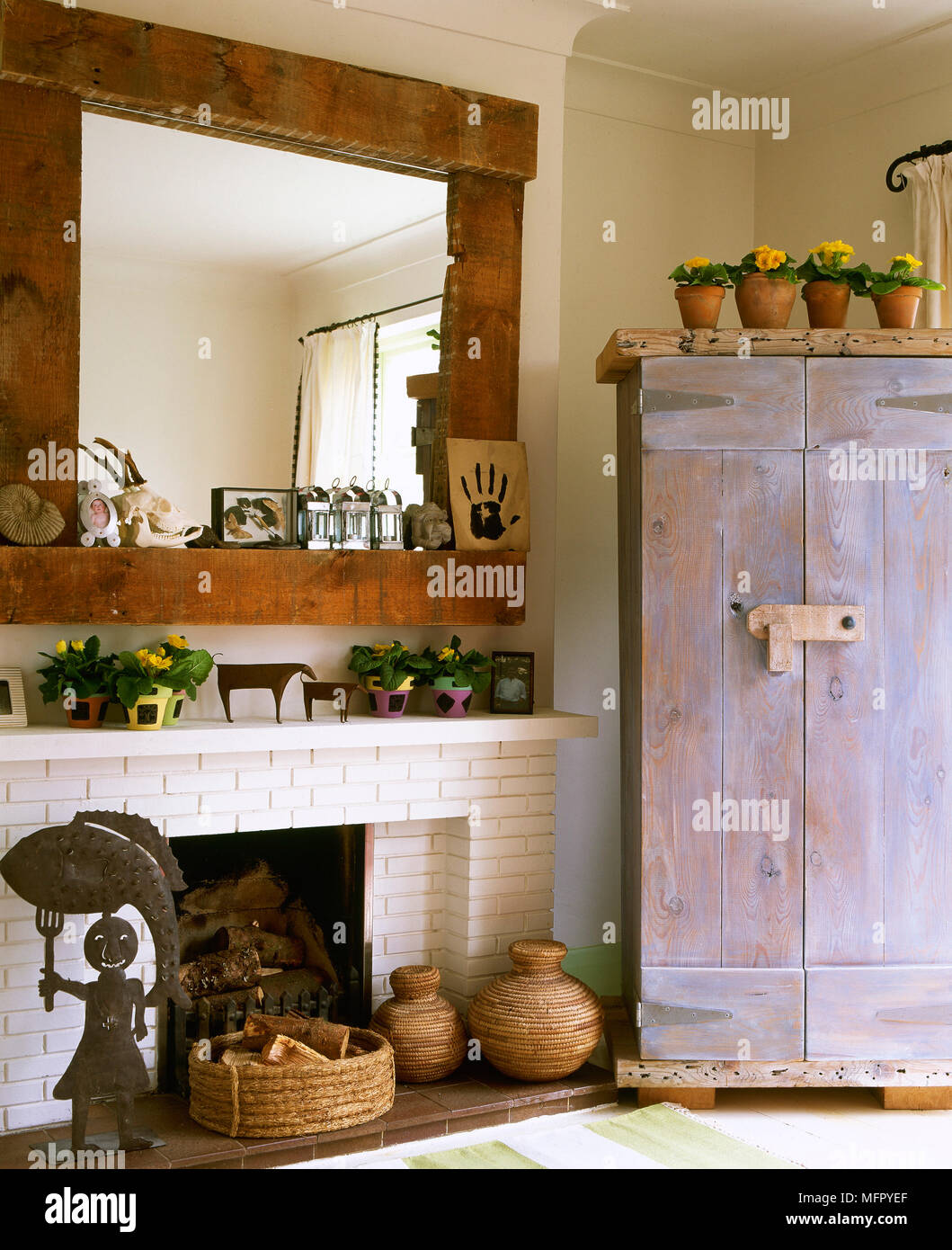 Country Sitting Room With A Painted Brick Fireplace Wood Mirror
