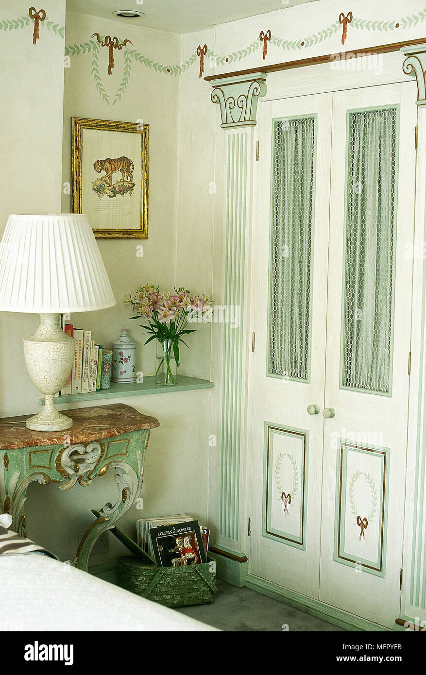 Traditional Bedroom With Decorative Painted Garland Built In