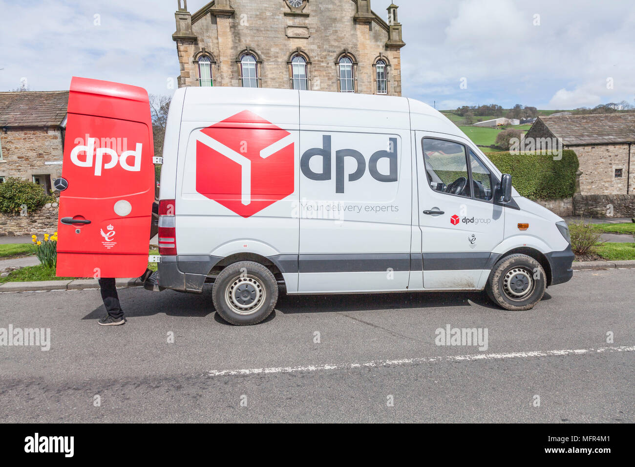 DPD delivery van and driver in Middleton in Teesdale,England,UK Stock