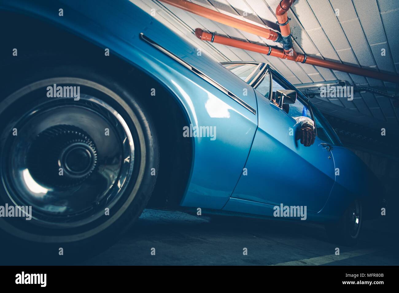 Underground Classic Rider. Men in the Vintage American Muscle Car Stock ...