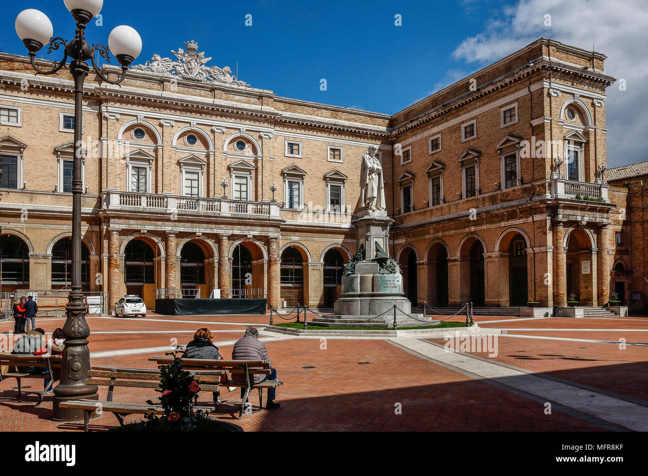 Italy Marche Recanati piazza Giacomo Leopardi - City hall and statue of Giacomo Leopardi Stock Photo