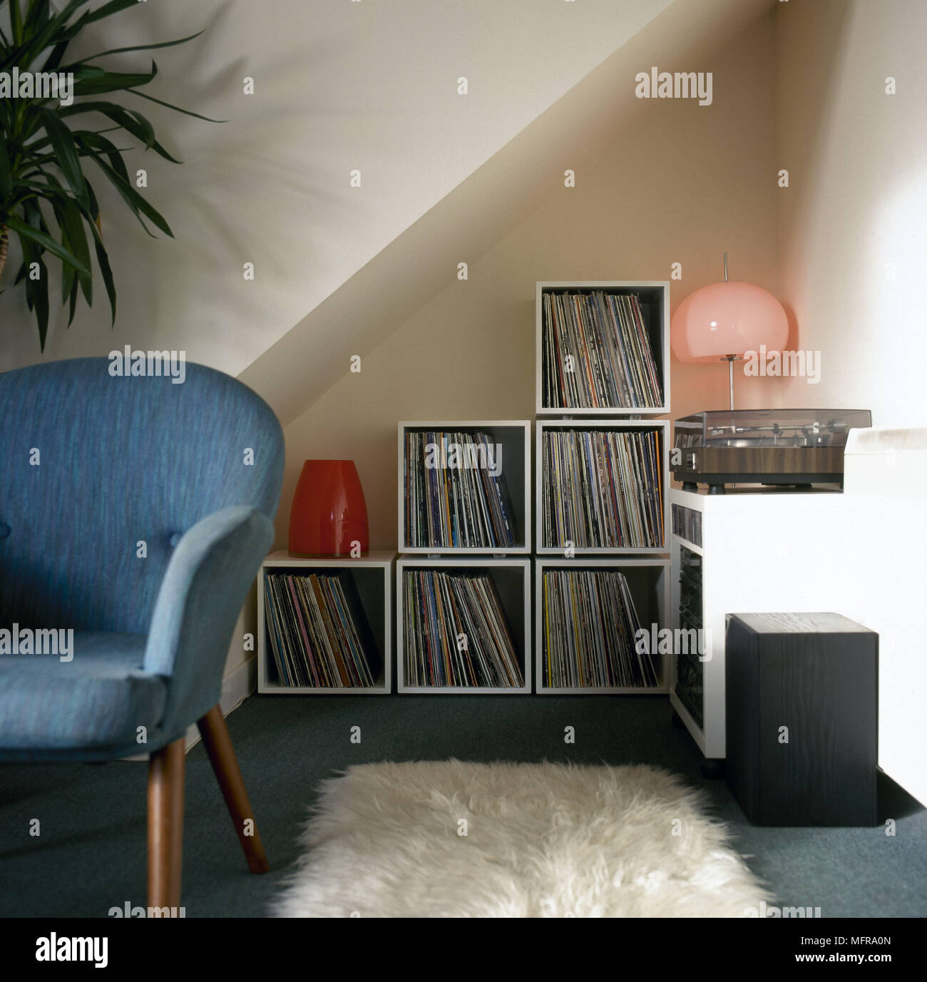 Modern sitting room detail records stored in cube storage boxes blue