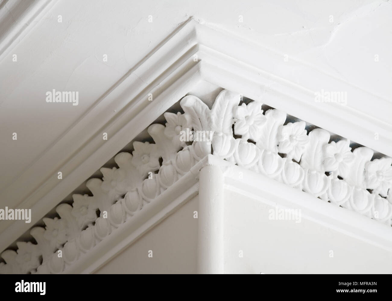 Plasterwork Moulding Around Corner Of Ceiling Stock Photo
