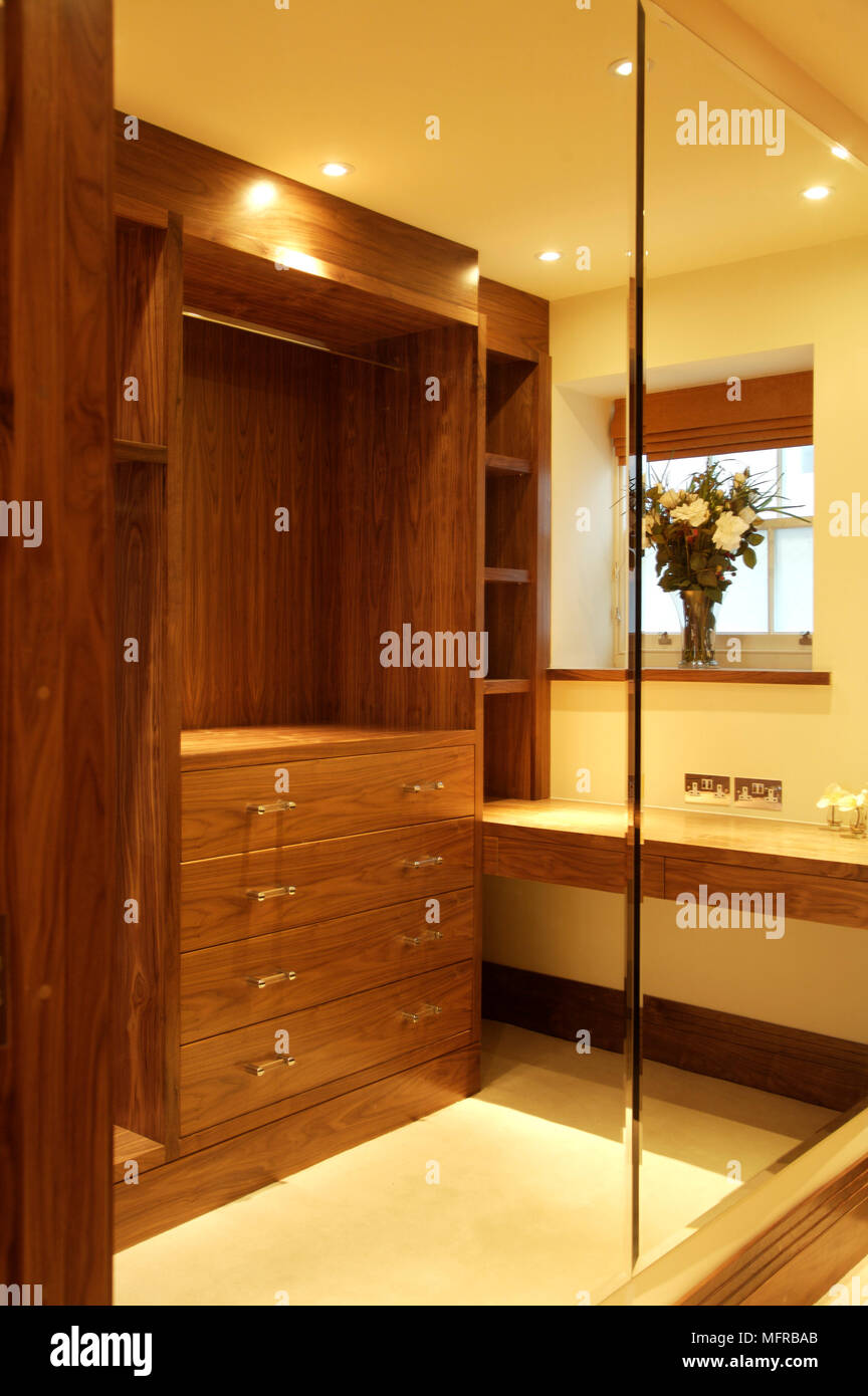 Wooden Wardrobe In Reflection From Large Mirror Stock Photo