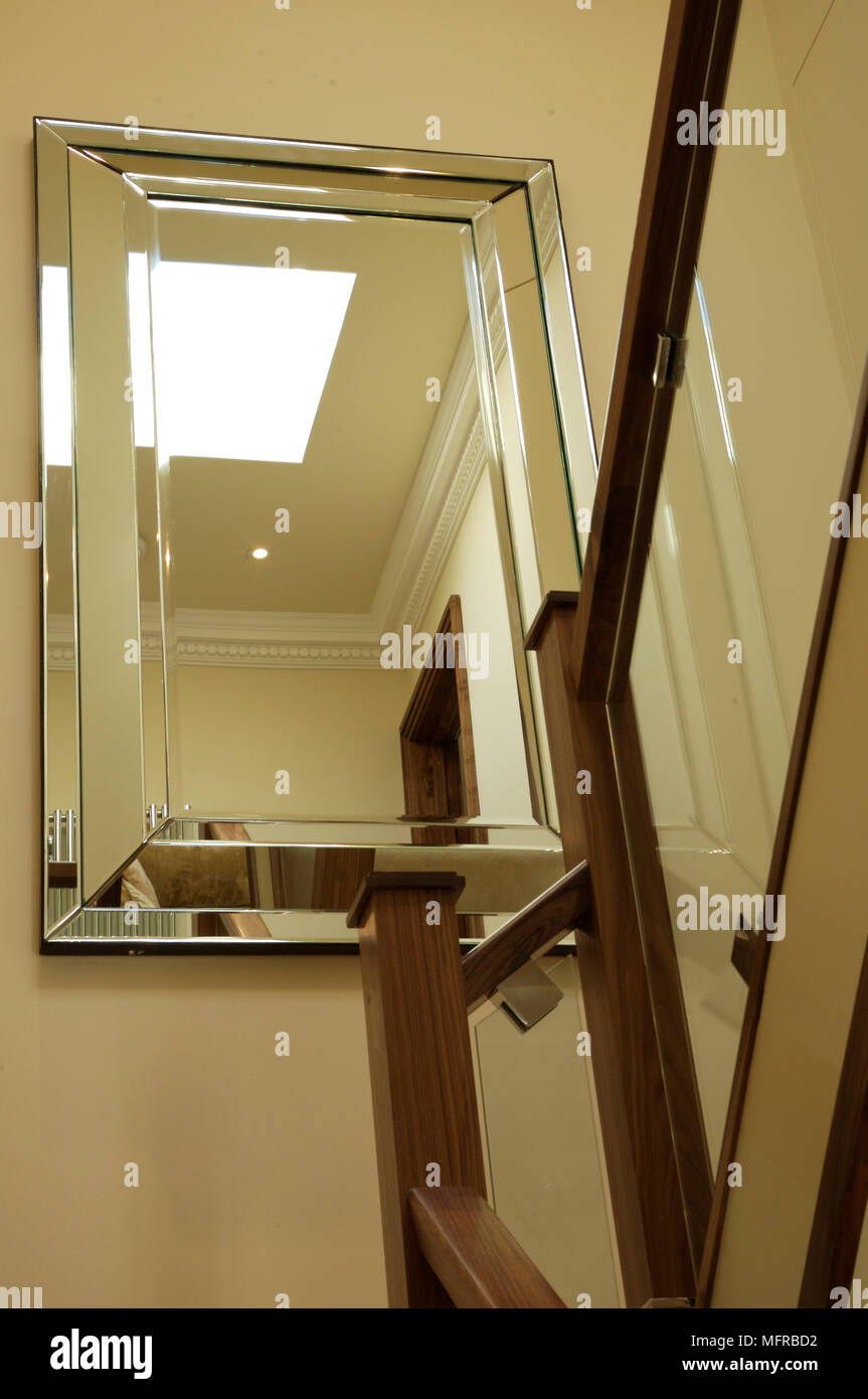 Rectangular silver framed mirror on staircase landing Stock Photo Alamy