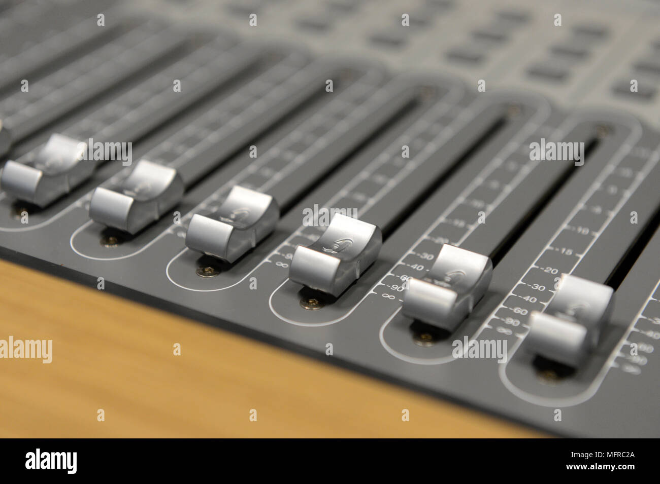 Close Ups of professional music mixing desks Stock Photo