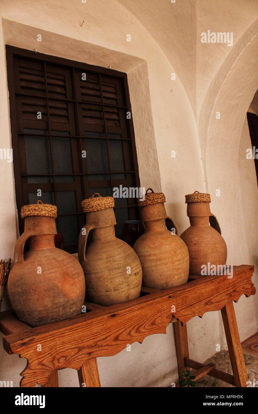 Clay pots for water in a typical courtyard of a Spanish house in