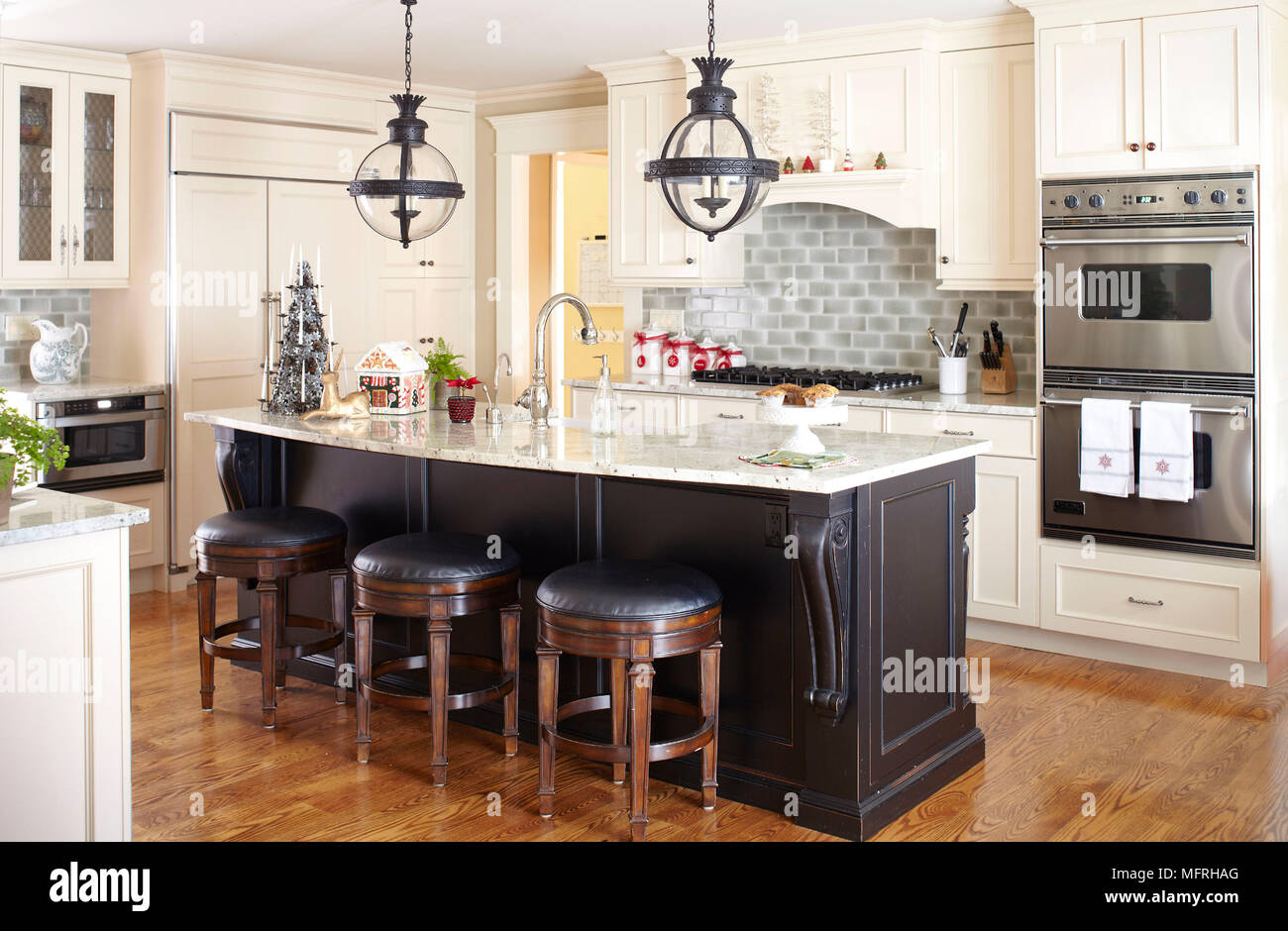 Bar Stools At Kitchen Island Breakfast Bar In Traditional Style Kitchen Fairfield New Jersey Usa Stock Photo Alamy