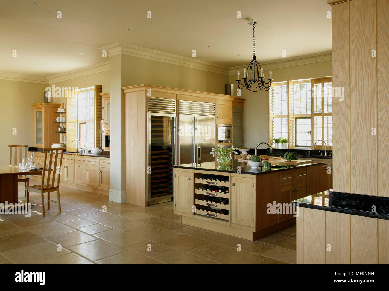 Modern country style kitchen with central island unit and wood units ...