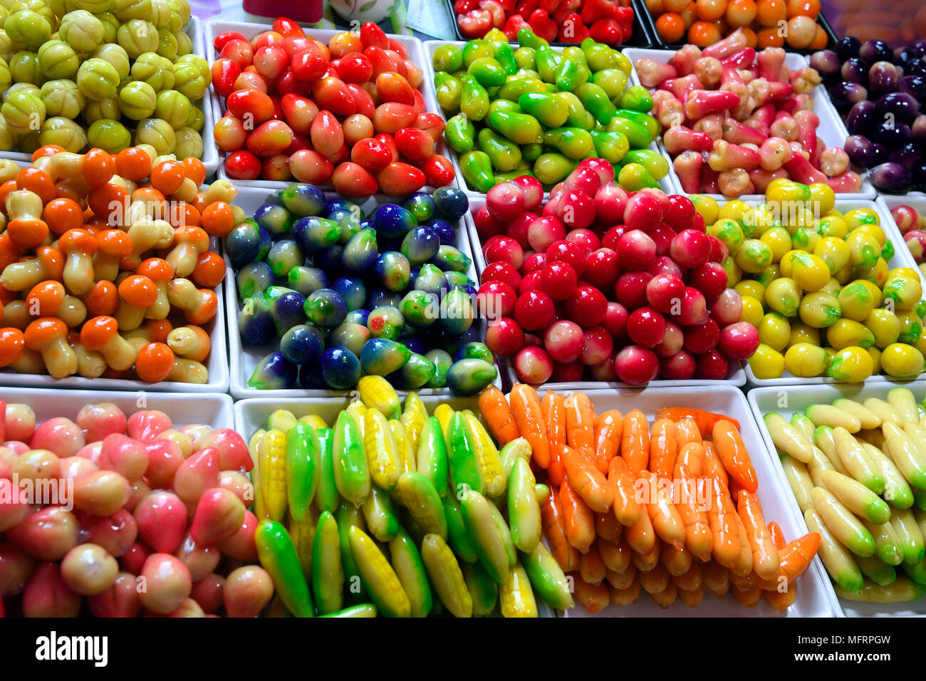 Display, colorful sweets made of sugar, Naka Weekend Market, Phuket, Thailand Stock Photo