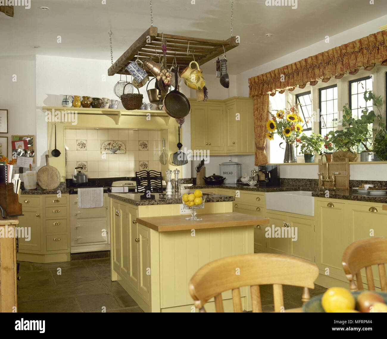 Country Style Kitchen with Pot Rack - Country - Kitchen