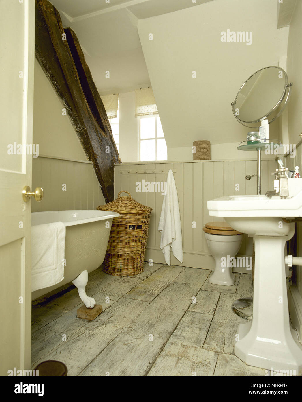 Rustic Country Bathroom With Wood Wainscoting Whitewashed