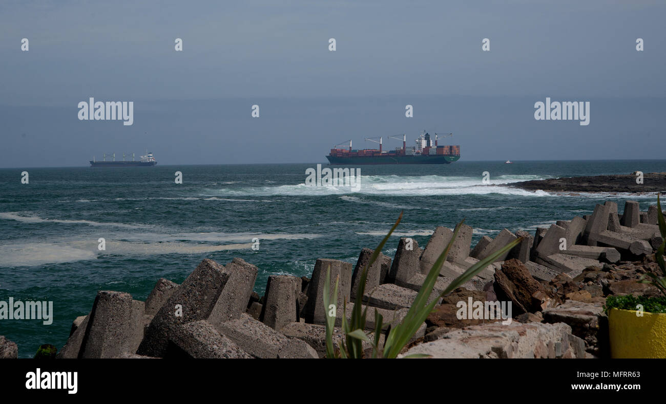 ships waiting to dock to offload there cargo in Arica Chile Stock Photo