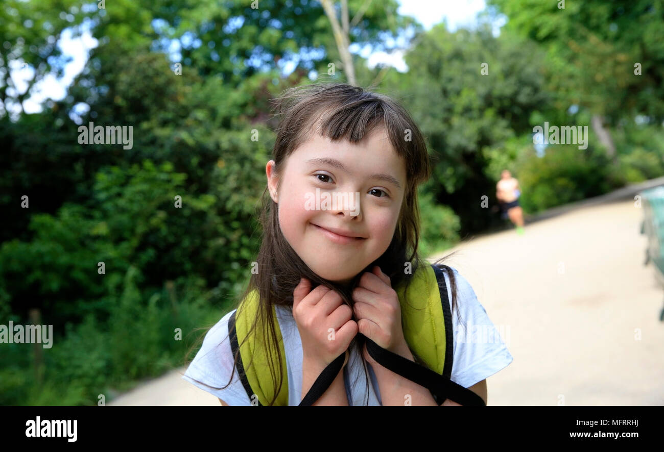 Portrait of little girl smiling in the park Stock Photo - Alamy