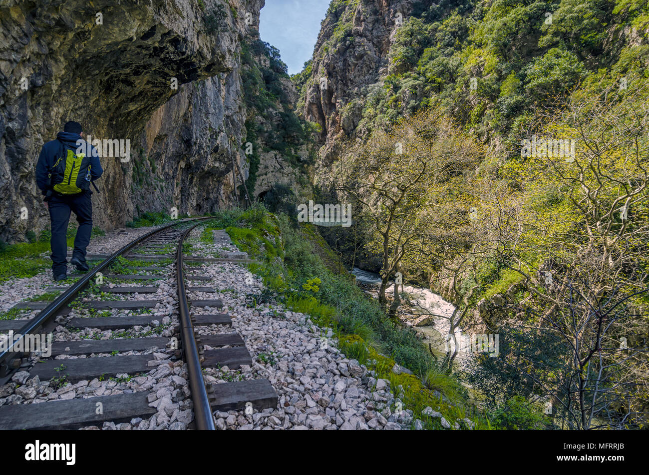 Hiking at Vouraikos gorge following the Diakopto–Kalavrita 'Odontotos' rack railway route. Peloponnese - Greece Stock Photo