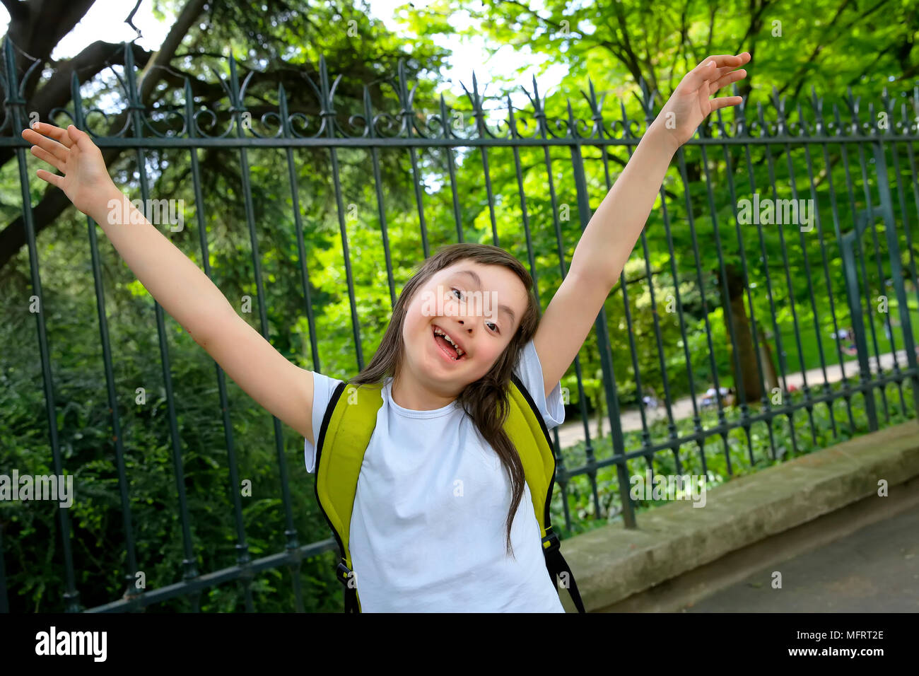 Portrait of little girl smiling in the park Stock Photo - Alamy