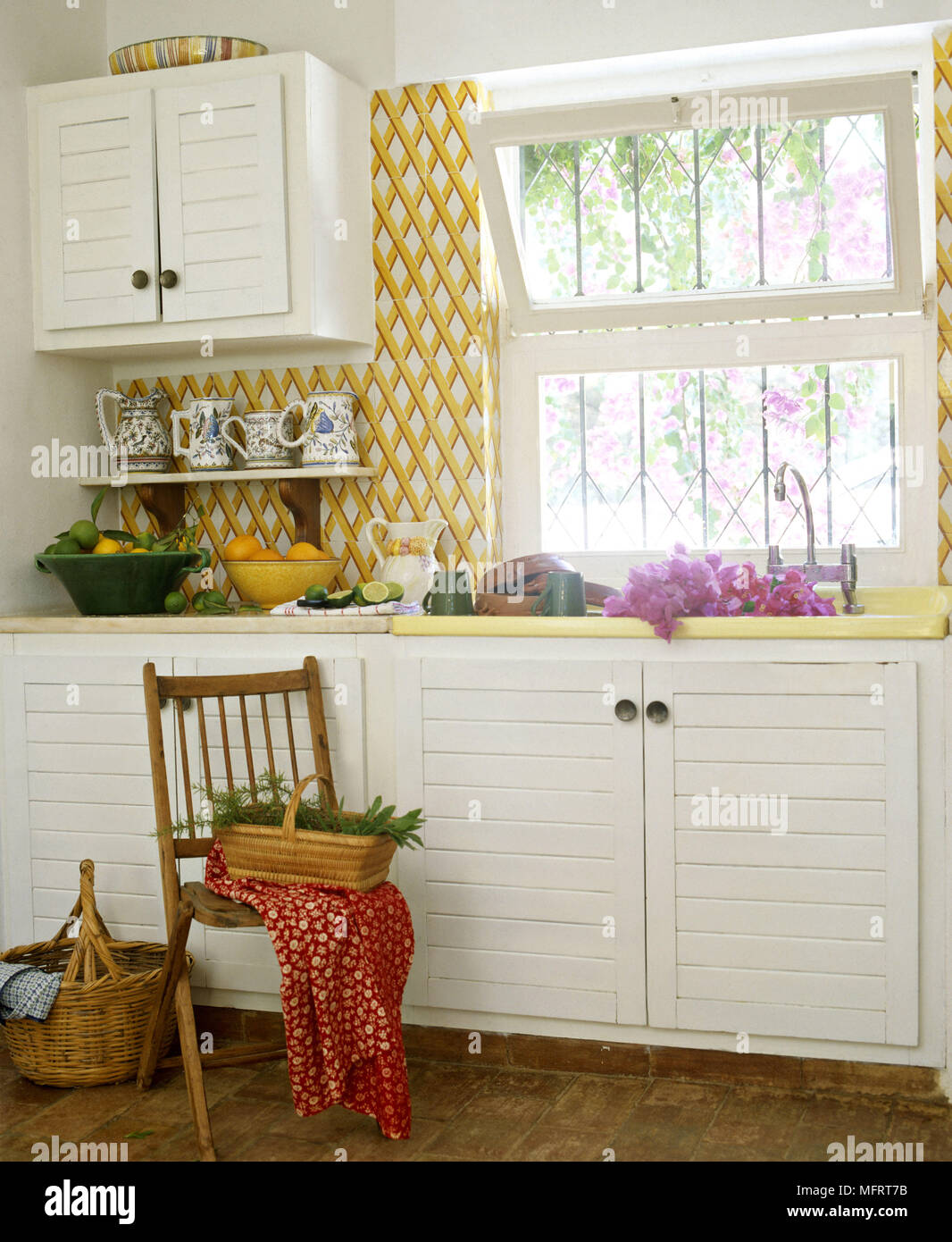 Kitchen sink in white cupboard unit Stock Photo Alamy